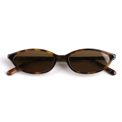 A pair of tortoise/brown framed sunglasses with warm brown lenses, crafted in a sleek oval silhouette. These premium sunglasses combine modern fashion with all-day UV protection, making them ideal for outdoor wear, driving, and lifestyle styling. The tortoiseshell pattern adds a timeless, versatile look that complements diverse face shapes and outfits.